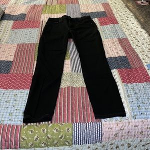 J. Crew Women’s 9" high-rise stretchy toothpick jean in new black.